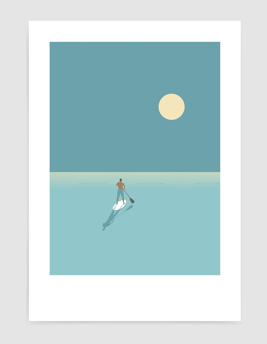 Paddleboarder at sunset