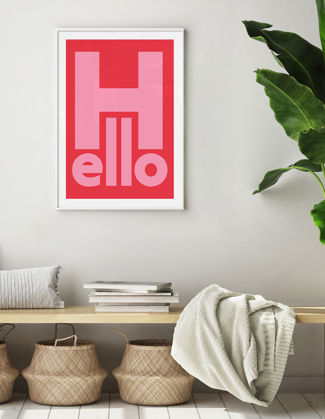 typography print with the word hello in pink bold type against a red background