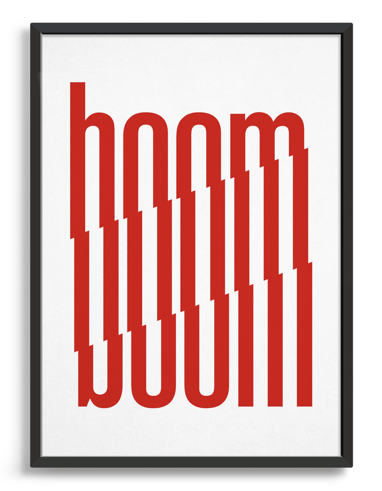 framed typography art print of the word boom in red text against a white background