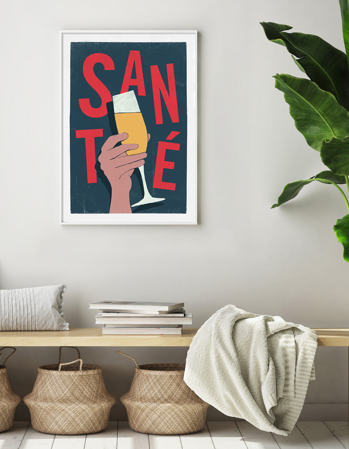 sante print shown on the wall in a hallway above a storage bench
