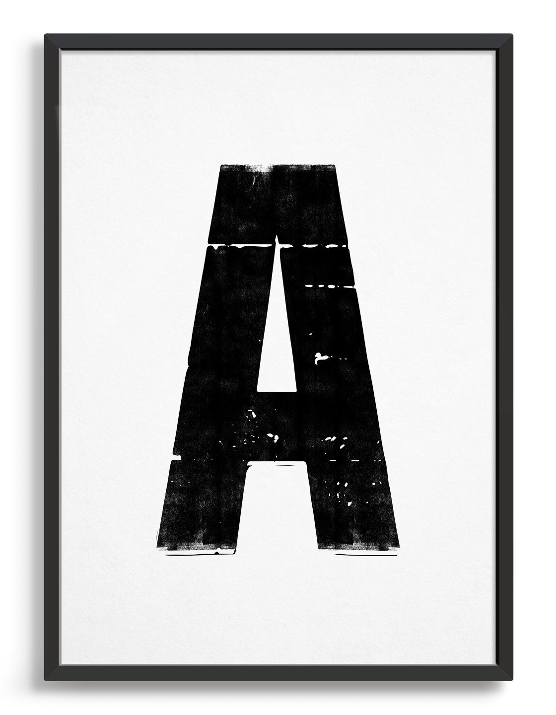 letterpress style alphabet print in blank font against a white background. Image depicts the letter A