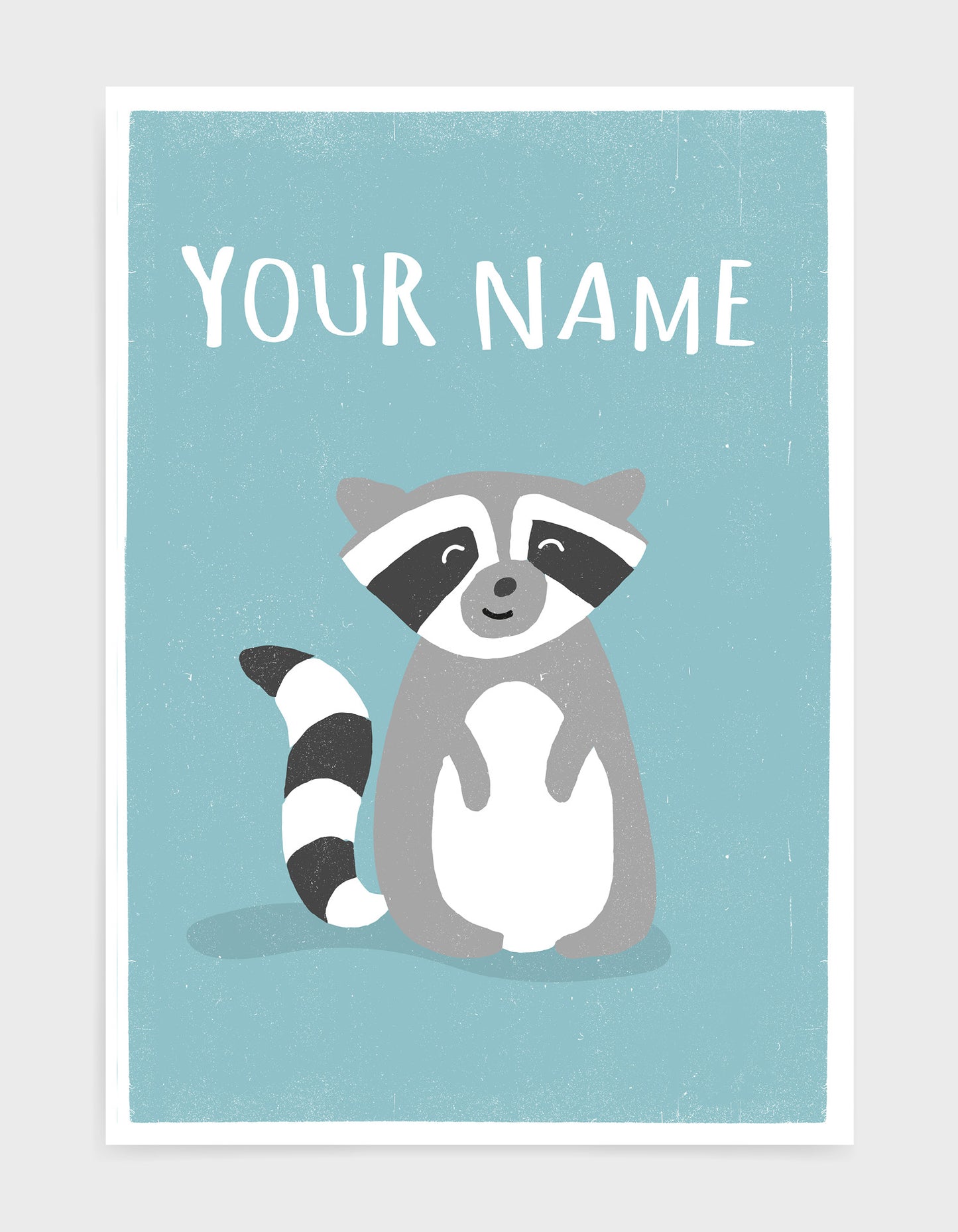 art print of a cute racoon on a light blue background with the words your name above as the product is available for personalisation