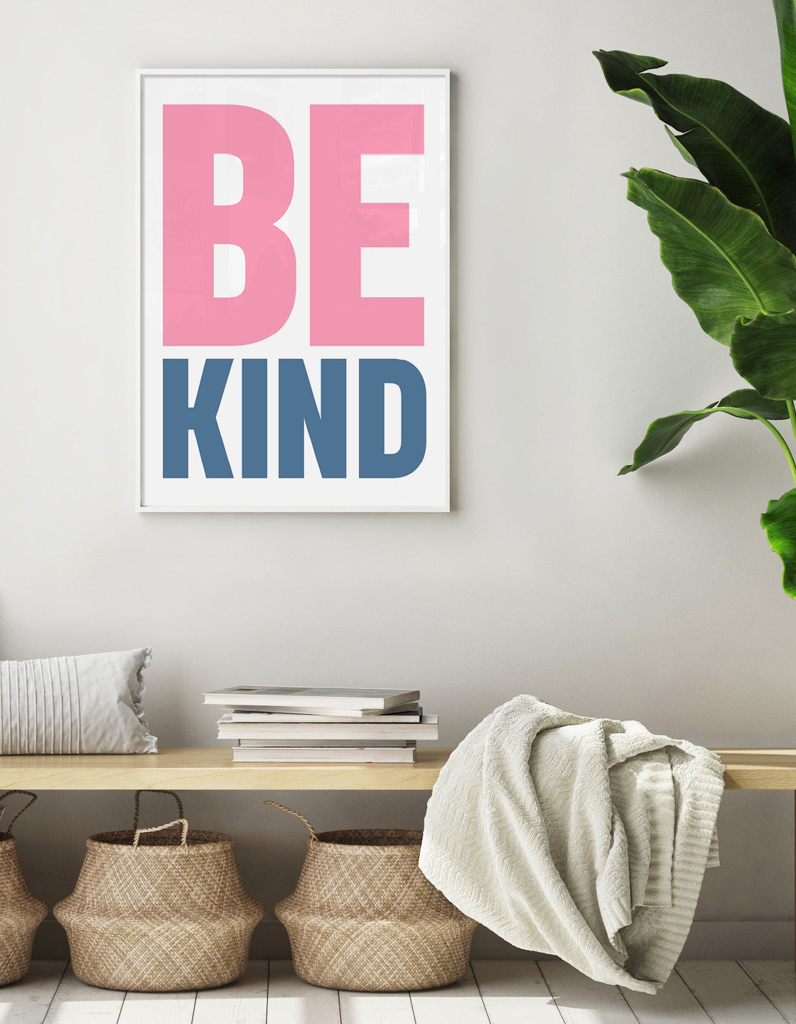 typographic art print with the words Be in pink caps and kind in smaller blue caps against a white background
