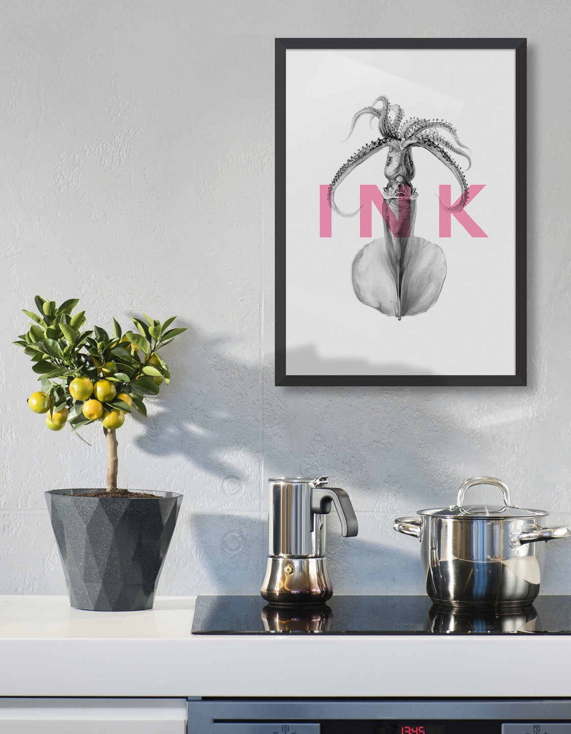 squid ink modern typography print. The word ink in pink text written horizontally over an image of a squid