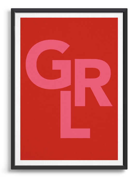 framed typography art print of the word GRL in pink text against a red background