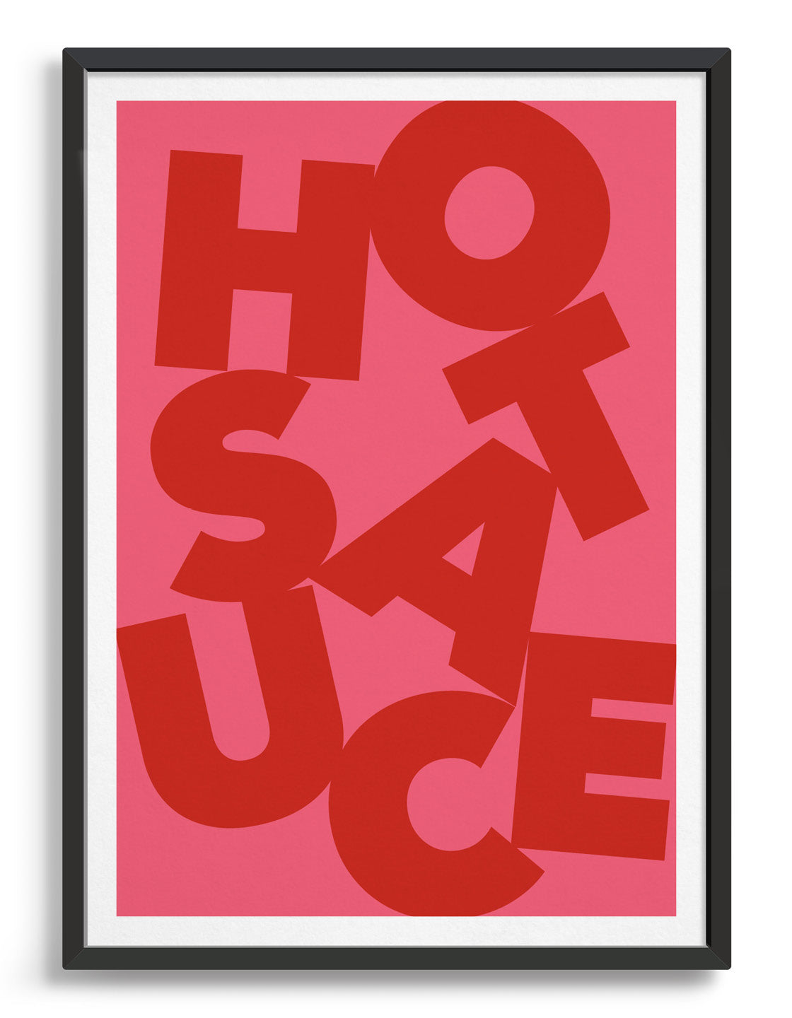 Framed typography art print of the word Hot Sauce in red text against a pink background