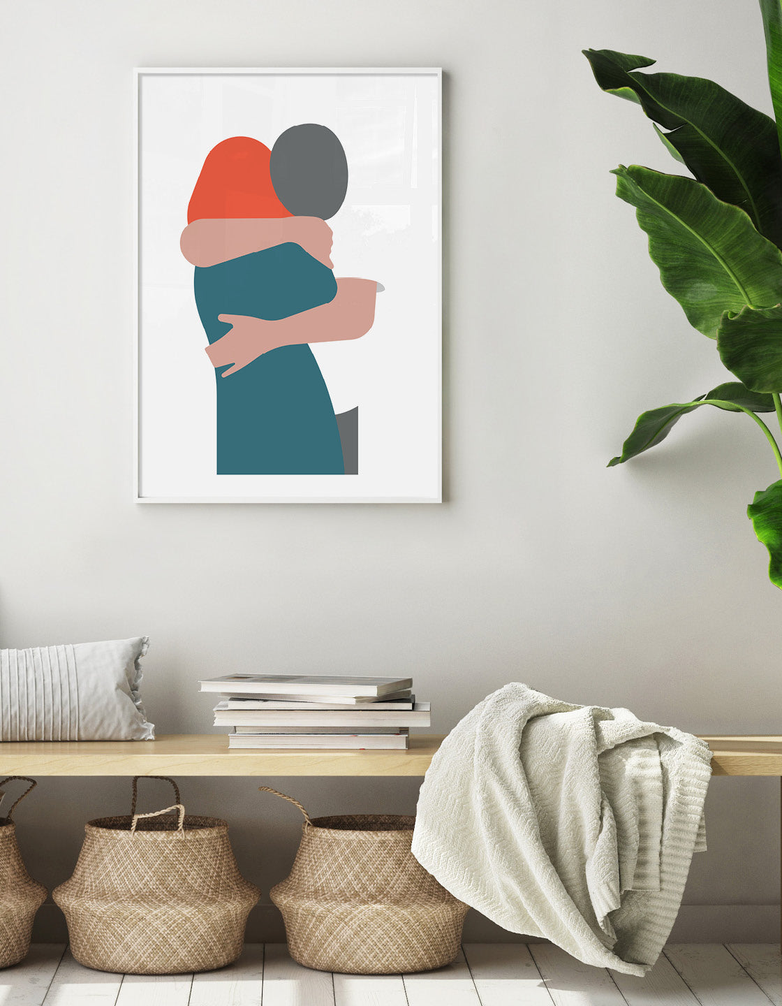 White art print depicting a woman with red hair in an embrace with a man wearing a white tshirt leaning over her shoulder a couple hugging.