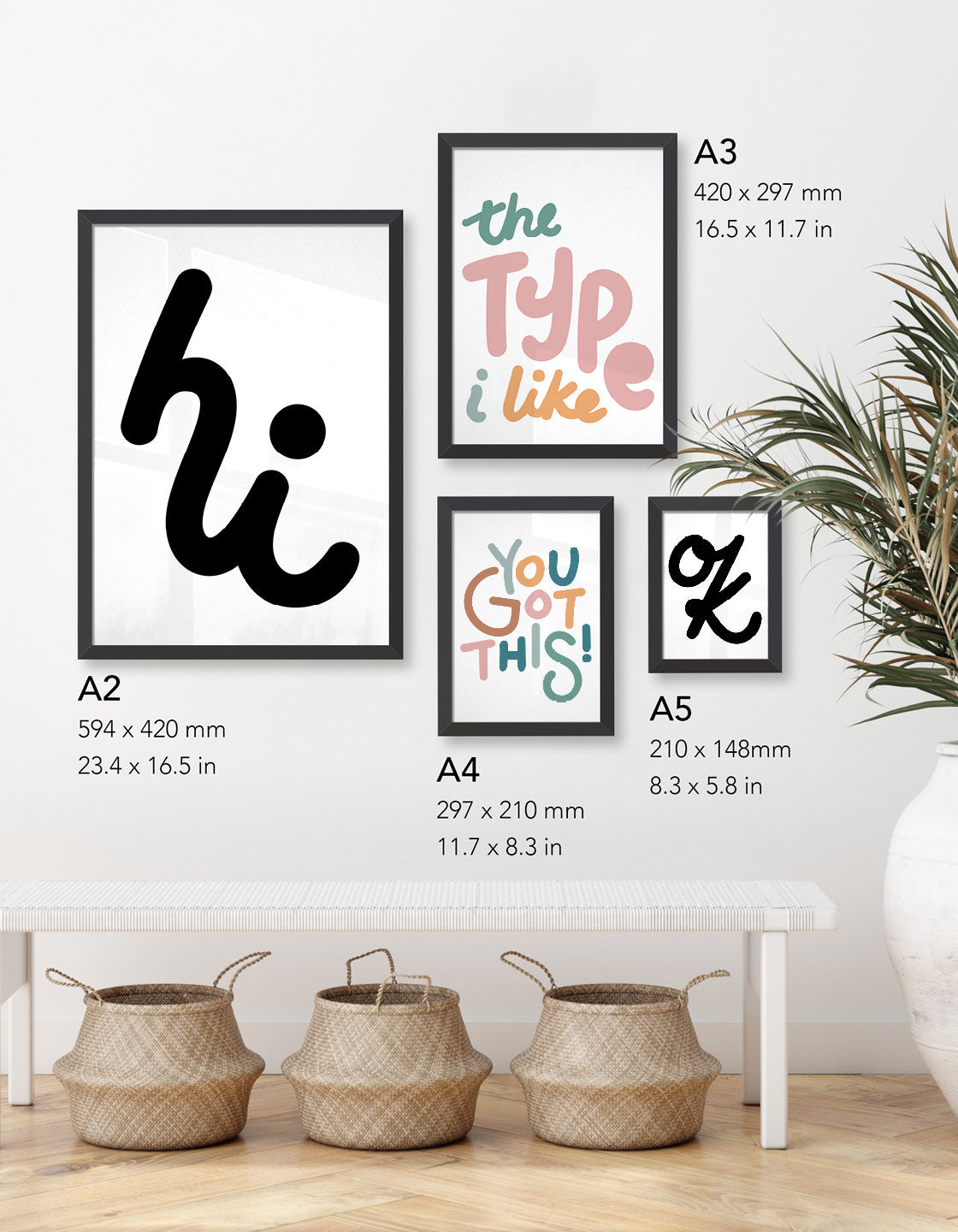 Example gallery wall image showcasing typography prints in varying sizes